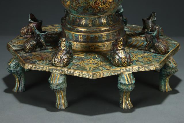 错金铜仪	，震古烁今