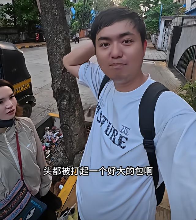 中国夫妻探秘印度贫民窟：丈夫被石头砸满头包，妻子一直被打臀部