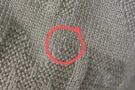 近两千元的阿玛尼毛衣有杂色混线 得物为消费者报销300元维修费图片