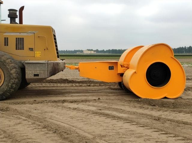铲车带的冲击压路机破解水泥路面破碎难题施工指南