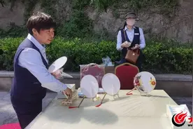 我在文明实践站过六一丨市北区阜新路街道小村庄社区开展“巧手绘团扇”主题活动图片