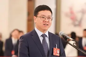 媒体关注北部湾港 | 张树新走上第二场“委员通道”：一条全新的国际物流大通道正加速延伸图片