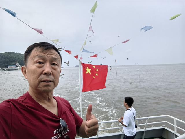 看獐岛海上日出起个“大早”，回沈阳路遇大雨赶个“晚集”
