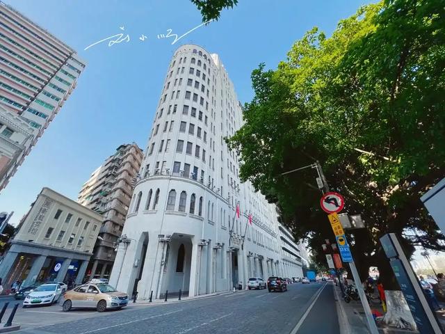 神似上海永康大楼?广州老城区这栋建筑成“网红”,游客扎堆打卡