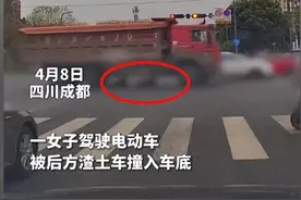 心脏在地上跳?渣土车无视黄灯，女子遭碾压，心脏裸露，已身亡!图片