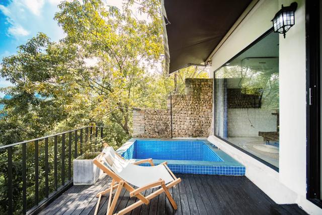 在临安,怎样才算“真土豪”?答案:买猪送房!