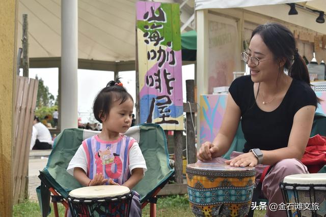 长假前两天，金石滩各景点活动多人气旺