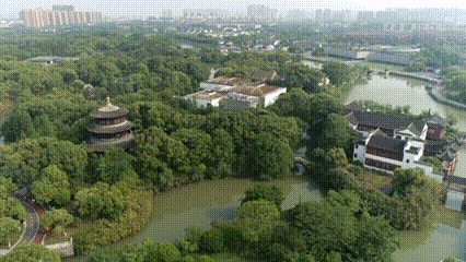 丹青泼墨处 烟火映新城