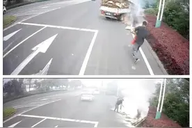 公交行驶途中遇货车突冒白烟，司机安顿好乘客后拿灭火器救火图片