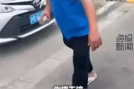 闹大了！女子遛狗尿车轮胎上！车主拿砖砸向对方小狗！已报警处理图片