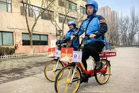 全省首例～外卖小哥进封闭小区配送有了“新坐骑”图片