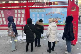 暖暖的！这里的 “邻里互助墙”传递爱心温度图片