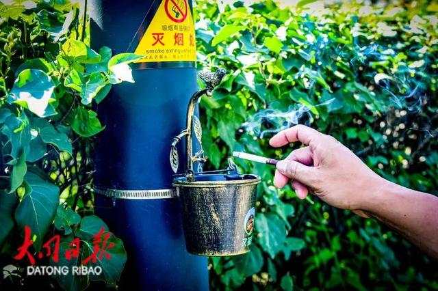 景区新神器！100个悬挂式烟头收集器“上岗”