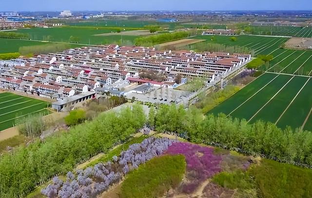 我国现存唯一的人民公社，记工分、分口粮，人均收入5000多