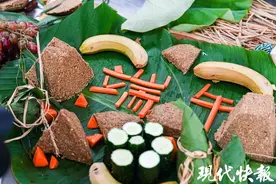 无锡动物园备“花式”粽子，黑猩猩小熊猫小白虎卷尾猴“吃播”上线图片