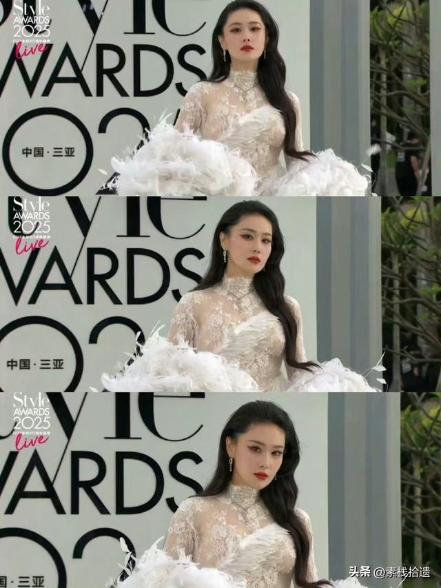 张馨予身穿重达25斤 礼服亮相，半透视黑色蕾丝连衣裙性感霸气