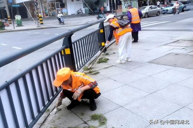 湖北荆州：人群中的一抹橙，守卫城市洁净