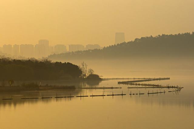 美丽中国｜日出日落画江城 杳杳长空敛云烟
