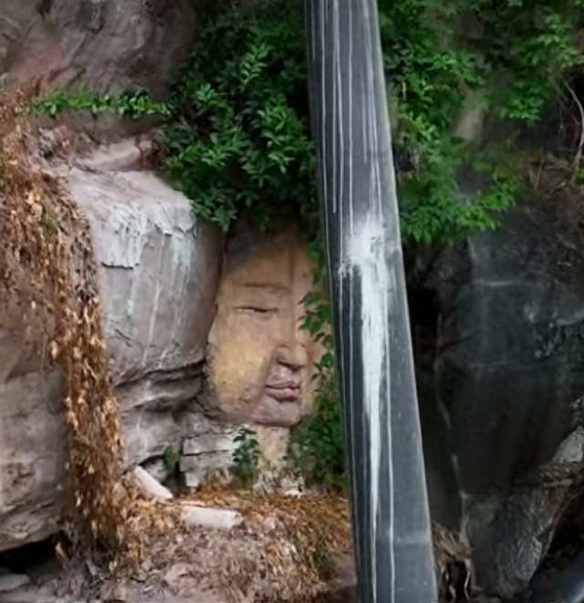 重庆江边崖壁发现一处佛头塑像！雕刻者已找到，文旅部门回应