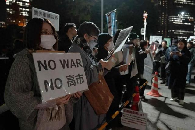 高市话音刚落，王毅定调统一，人民日报通知日本，国民党呼吁避战