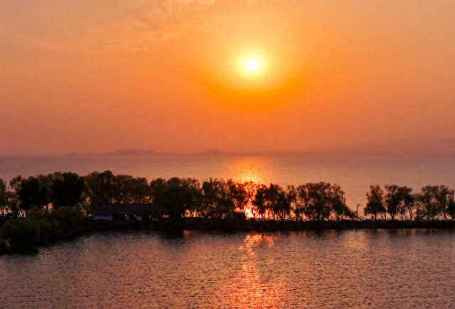落霞与孤鹜齐飞，野鸭湖湿地再现中国式浪漫意境