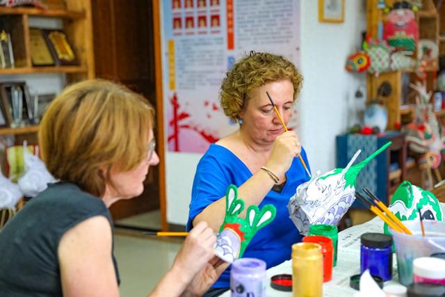 好评中国丨打造成世界的“会客厅”：从“进得来”到“玩得好”