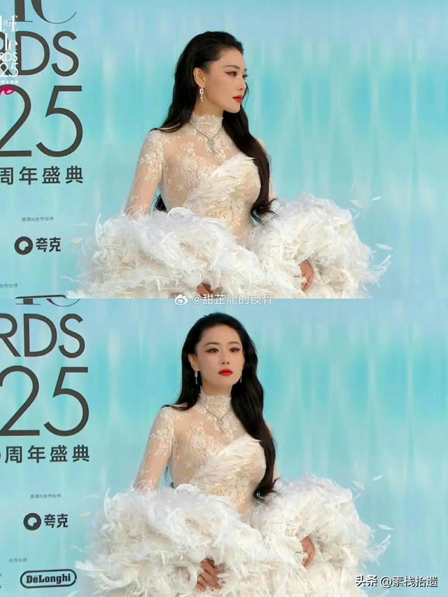 张馨予身穿重达25斤 礼服亮相，半透视黑色蕾丝连衣裙性感霸气