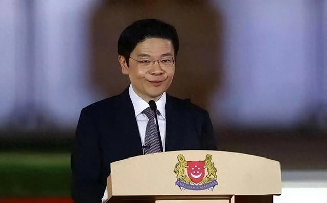 新加坡总理公开支持高市后，被罚18亿账单的金龙鱼	，凉得更快了