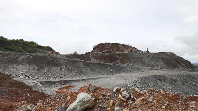 开挖掘机游戏破解版（海南昌江3亿吨尾矿渣石正在变废为宝）