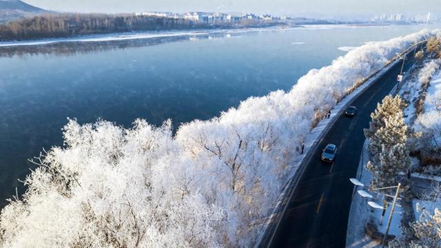不是日本！不是韩国！这个人少静谧的雾凇仙境，感受一场玉树琼花