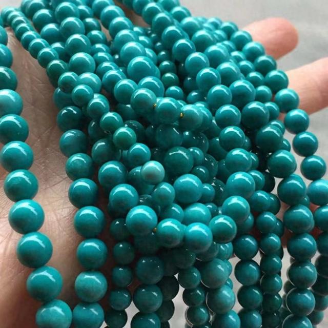 优化绿松石分辨（教你快速分辨优化绿松石和原矿绿松石）