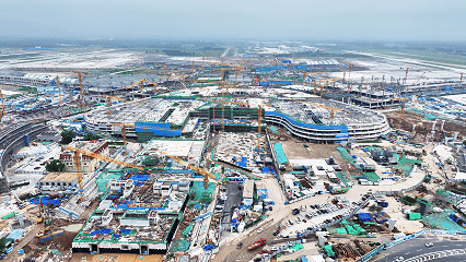 助力空港蝶变！济南遥墙机场交通枢纽中心封顶