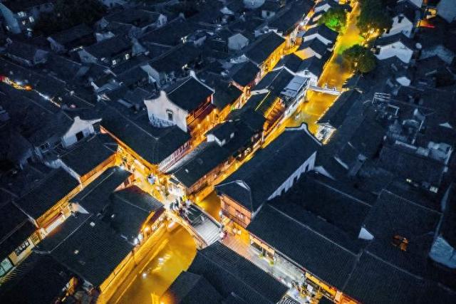 新场古镇与江浙12个古镇携手申报世界文化遗产，取得这两项阶段性成果