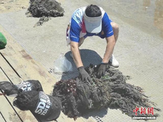 守护蔚蓝渤海 秦皇岛“海洋卫士”自费深潜清污