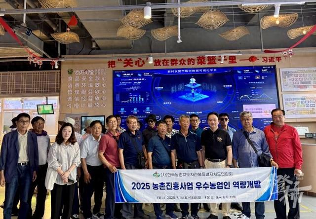 临平前村农贸市场，韩国旅游团一波一波来打卡，每次都现场买西瓜