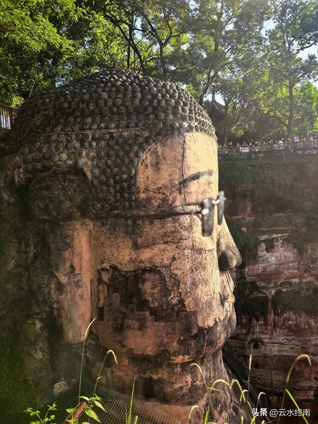 乐山大佛是哪尊佛？为什么是唐代的佛身，民国的佛头？能镇水吗？