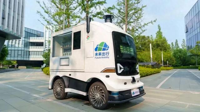 江苏南京生态科技岛园区来了“新同事” 无人物流车招手即停