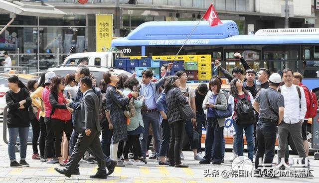 微信支付带动中国游客境外消费 韩国交易量同比增46%