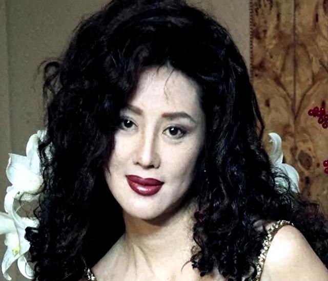 她是中国第一美妇，拍过风月片，蹲过牢离过婚，也被克林顿接见