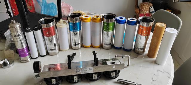 海尔立式空调滤网怎么拆图解移动端（海尔净水机更换滤芯前后对比）