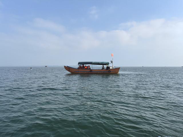 七绝·东兴万尾金滩游