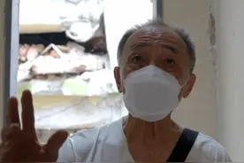 #缅甸强震亲历者回忆惊魂时刻  4月1日，新华社记者跟随采访中国救援队和中国香港特区救援队联合搜救时，在震后的天空公寓采访了两位回来查看房屋情况的强震亲历者。（记者：才扬）视频封面