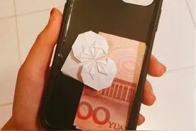 有手机的朋友注意！最好在手机壳后面放张人民币，看完恍然大悟！图片