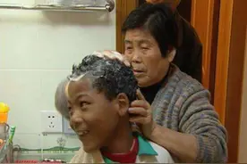 上海60岁老太，捡一黑人弃婴养育20年，现在怎么样了？图片