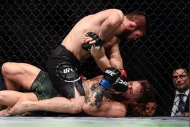 UFC史上最大斗殴丑闻！打完嘴炮打教练，整个UFC都打不过他图片