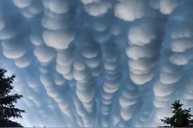 会有特别的寓意吗？郑州上空又出现乳状云，具体的形成原因是啥图片