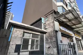 墙砖不停掉，北京东三环一小区告赢开发商获赔七百万图片