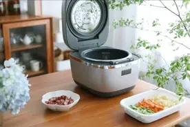 电饭煲内胆的涂层掉落了，会对人体有害吗？需要换新的吗？图片