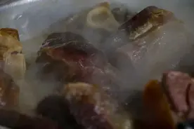 舌尖上的乡愁——无量山火腿木瓜鸡图片