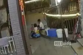 10岁哥哥抱起小妹躲避高空坠物图片